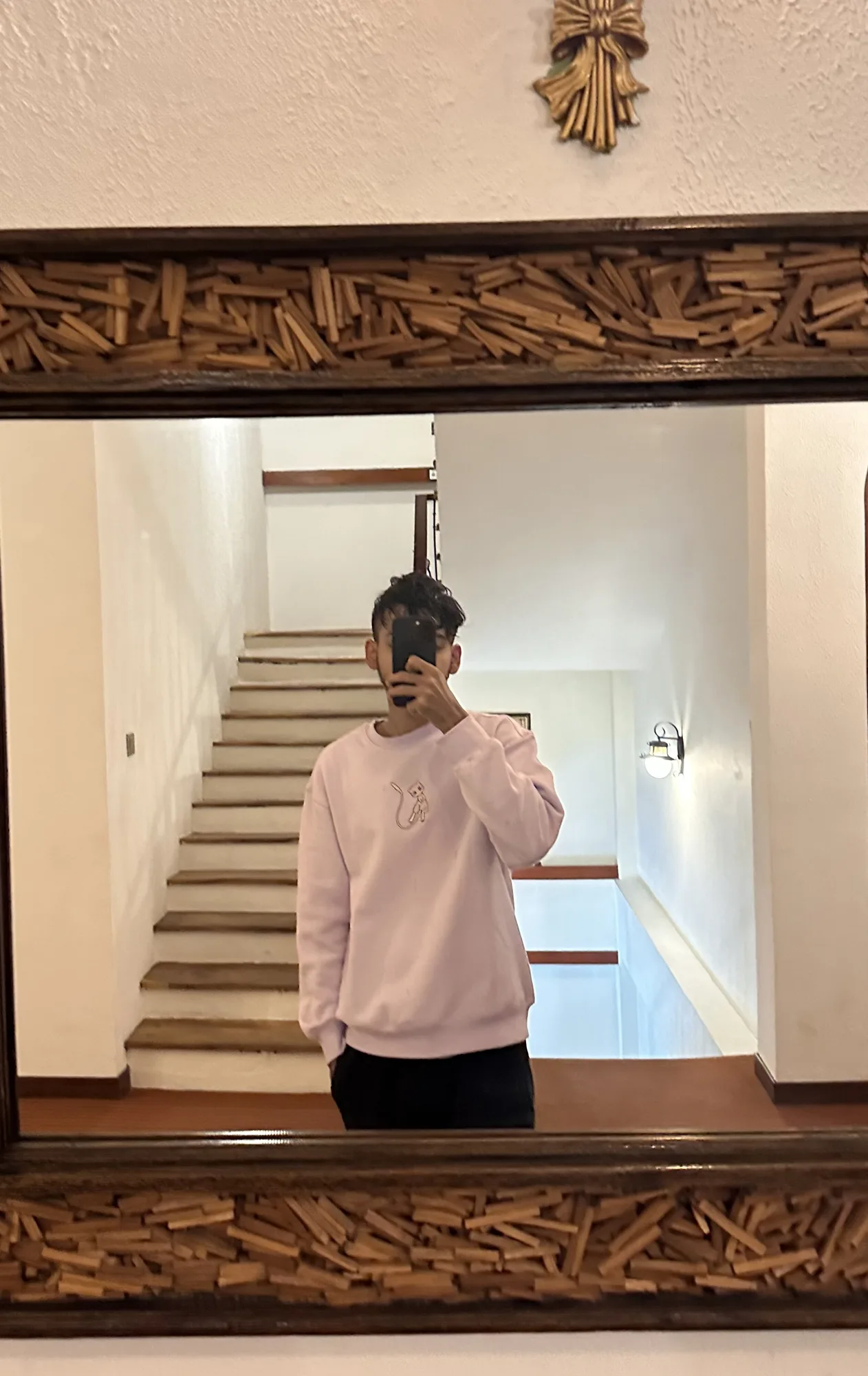Mirror on the stairs at The Wind Castle, the morning we checked out